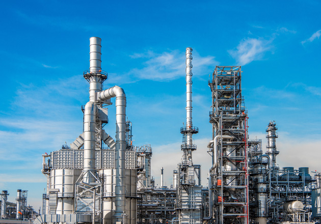 A large industrial refinery with pipes