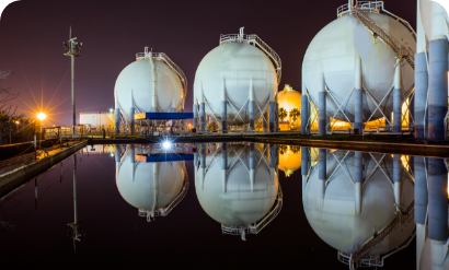 Reflection of tanks in water at night