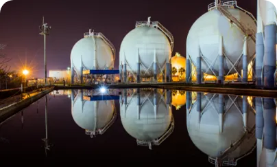Reflection of tanks in water at night