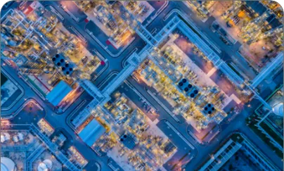 An aerial view of an industrial plant at night