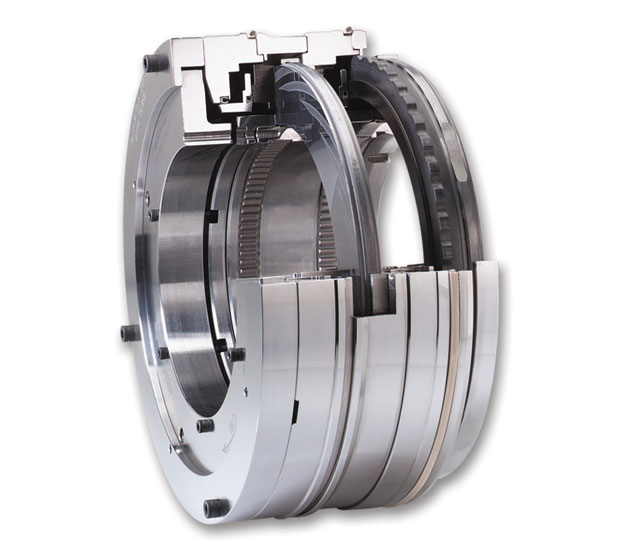 A close up of a metal bearing on a white background