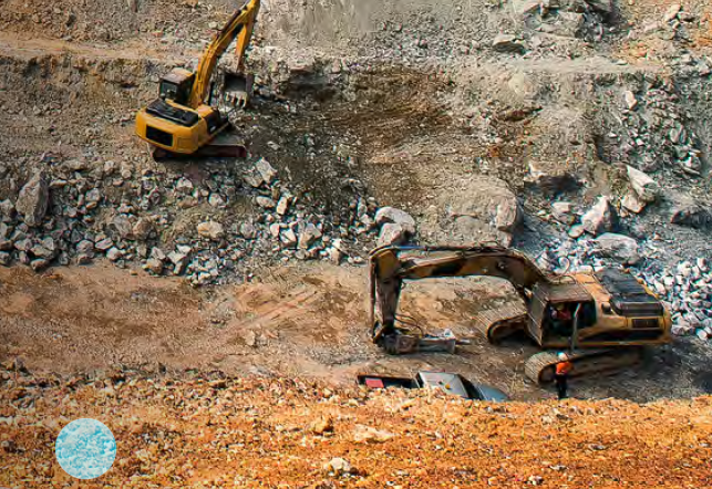 Aerial view of two excavators working in a mine.