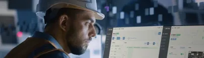 Male Engineer Reviewing Dashboards