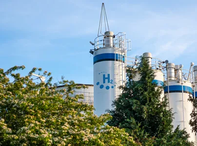 Hydrogen Renewable Energy Production With Trees In Foreground